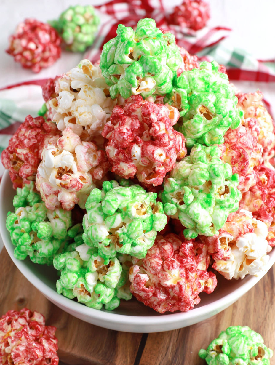 A bowl of colorful popcorn balls.