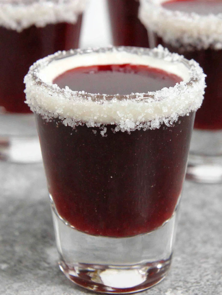 A glass of Chambord shots.