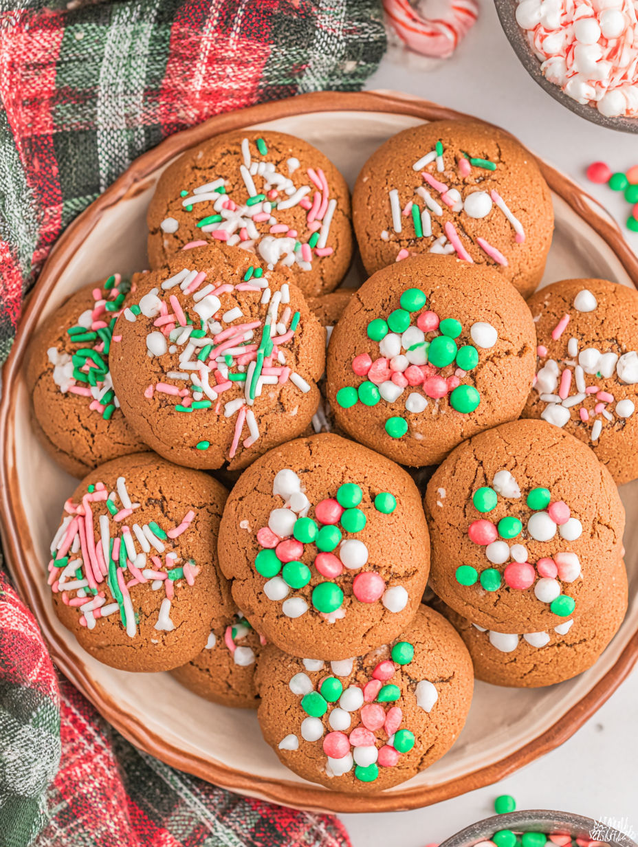A bowl of cookies with green, red, and white sprinkles.