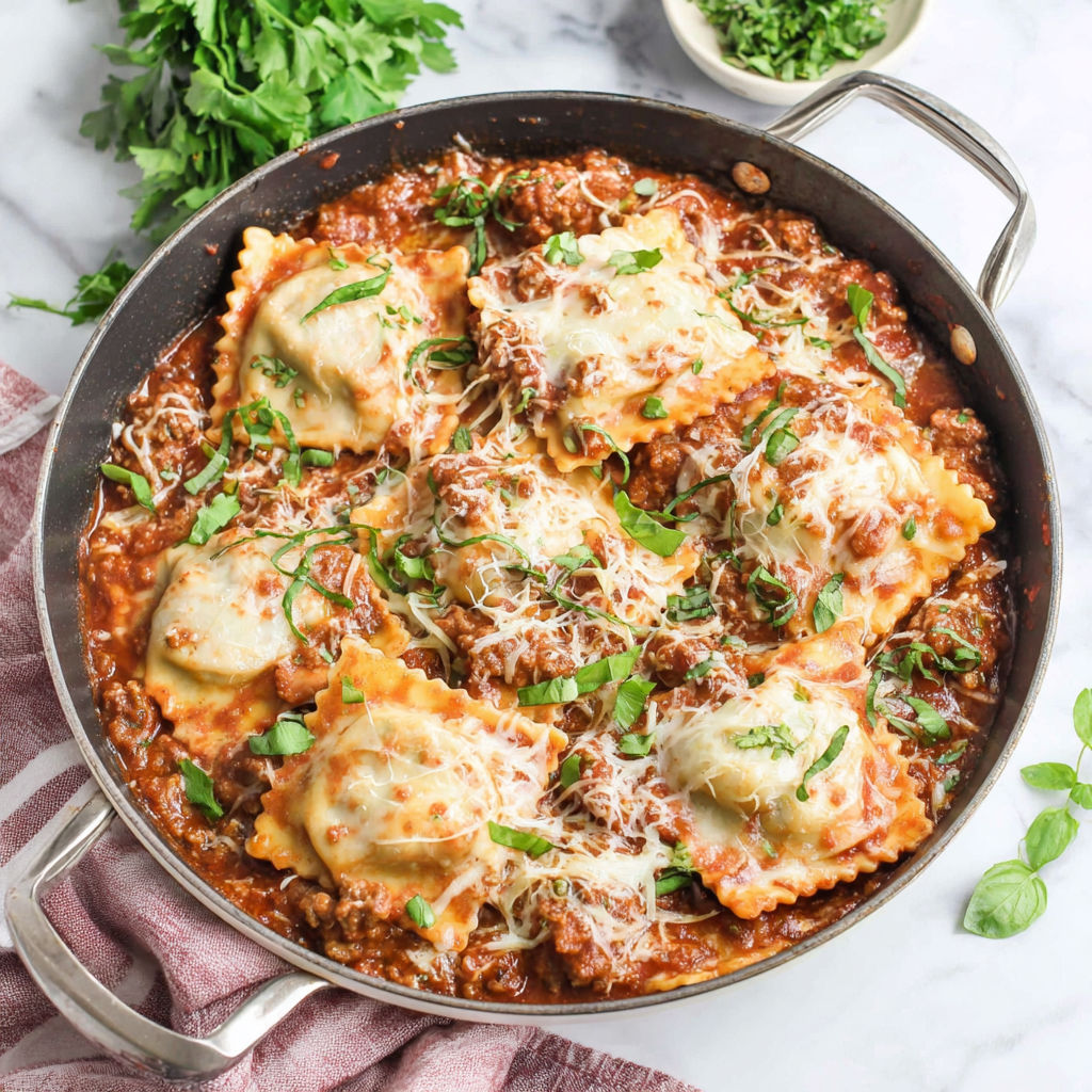 A skillet filled with pasta and meat.