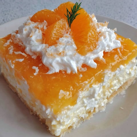 A slice of orange jello salad.