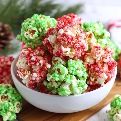 A bowl of Christmas popcorn balls.