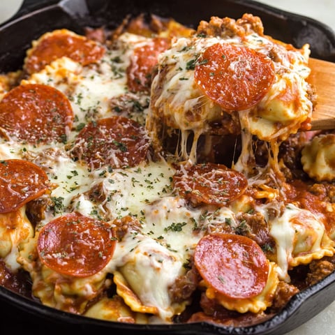 A skillet filled with meat lover's pizza ravioli.